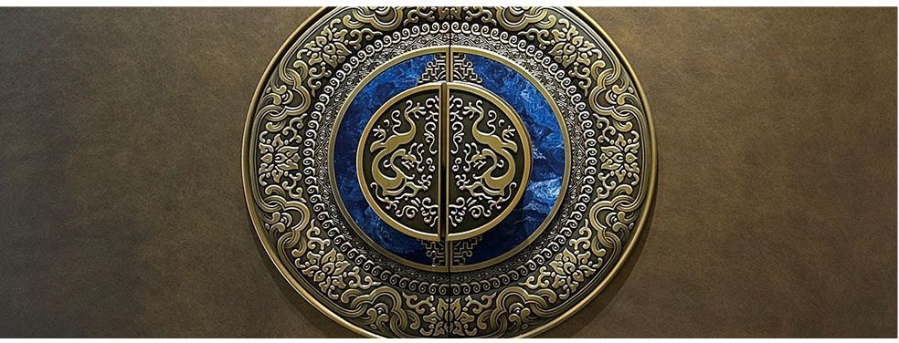 Bronze medallion handle with blue enamel inlay