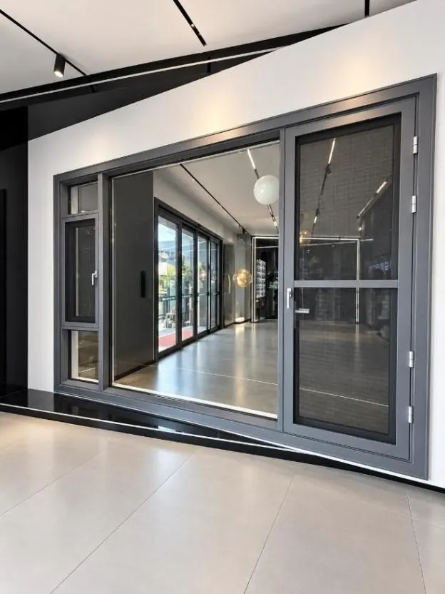 55 series thermal break aluminum casement door and window profile in a showroom
